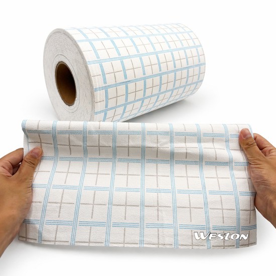 Weston's Solvent Resistant Wipes Material cloth hold by a hand